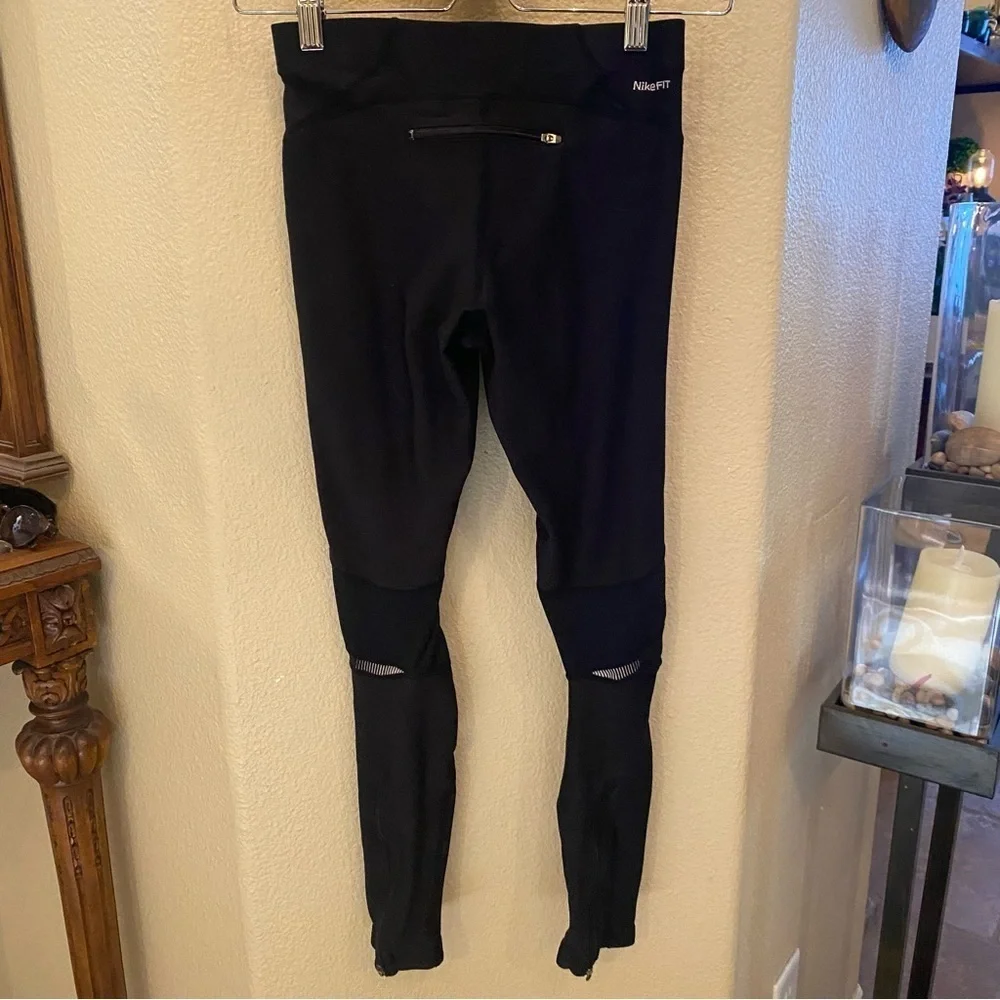 NIKE Women Black Zipper Side Hem Athletic Leggings Size XS